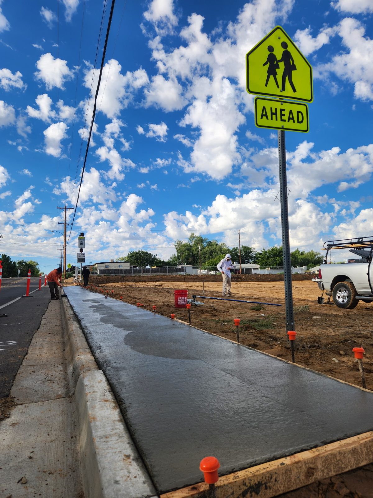 Fresh concrete sidewalk pour